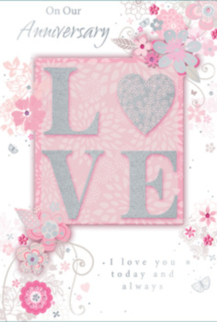 An anniversary card lies open as though freshly placed on a table in a Lewisham townhouse, its design suffused with the glow of soft, natural light. The main motif on the front is the word LOVE, printed in bold, elegant letters and finished with a frosted, glittering texture that catches the light like sunlight on a vase of freshly delivered flowers. Each letter is slightly raised, giving a pleasing tactile dimension that begs to be traced. Surrounding this central word, wispy, hand-drawn blooms and sweeping sprays of foliage drift along the borders and across the corners. Their tones of blush pink, muted lilac, and creamy ivory blend in gentle harmony, evoking the kind of pastel arrangements often chosen for anniversary deliveries around Brockley and Hither Green. Fine filigree lines weave through the flowers, forming dainty leaves and soft curls, while almost-hidden butterflies rest among the petals, adding a quiet sense of movement and fluttering emotion. The illustration style feels like a florist's sketchbook brought to life in ink and shimmer, with each line suggesting the curve of a stem or the opening of a new bud. Inside and on the front, the message I love you today and always appears in an understated, flowing typeface, leaving plenty of breathing space so the eye can rest on both the words and the artwork. The card's overall mood is tranquil yet deeply heartfelt, like stepping into a sunlit room where a hand-tied bouquet from Lewisham Flowers sits on the table, silently celebrating another year of shared mornings, conversations, and gentle promises renewed.